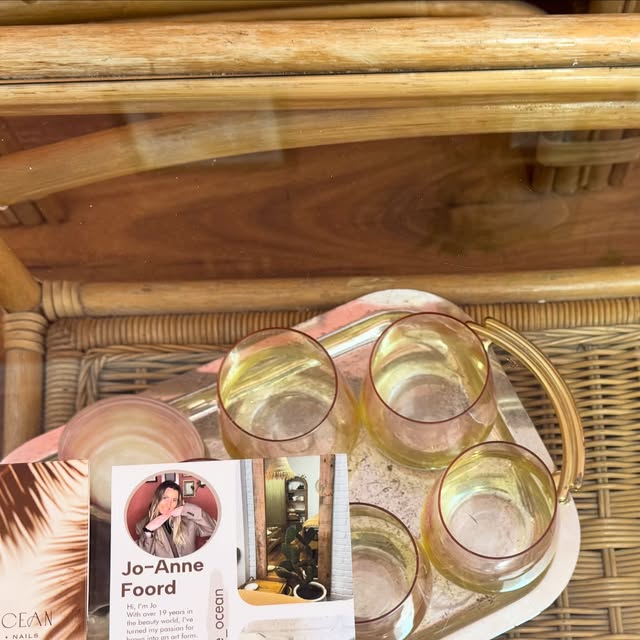 Amber glassware and rattan furniture in the treatment room