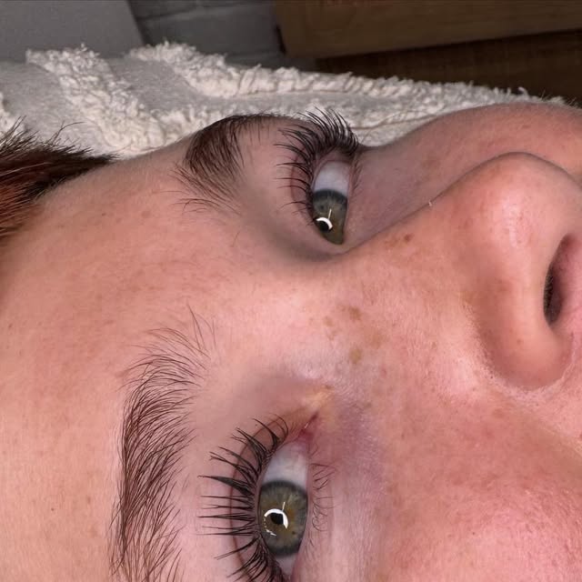 A finished Korean lashlift and tint, close up on a client's eyes